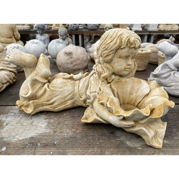 Boy Laying with Book and Girl Laying with Flower Medium Concrete Statue Pair - Image 2